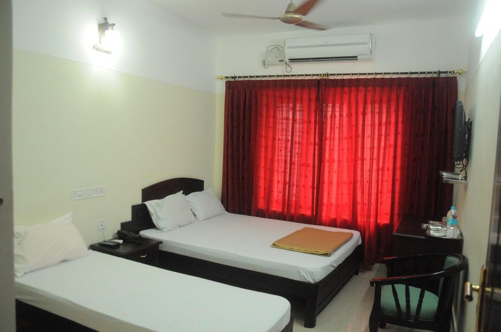 Dreamz Hotel Thiruvananthapuram Phòng bức ảnh